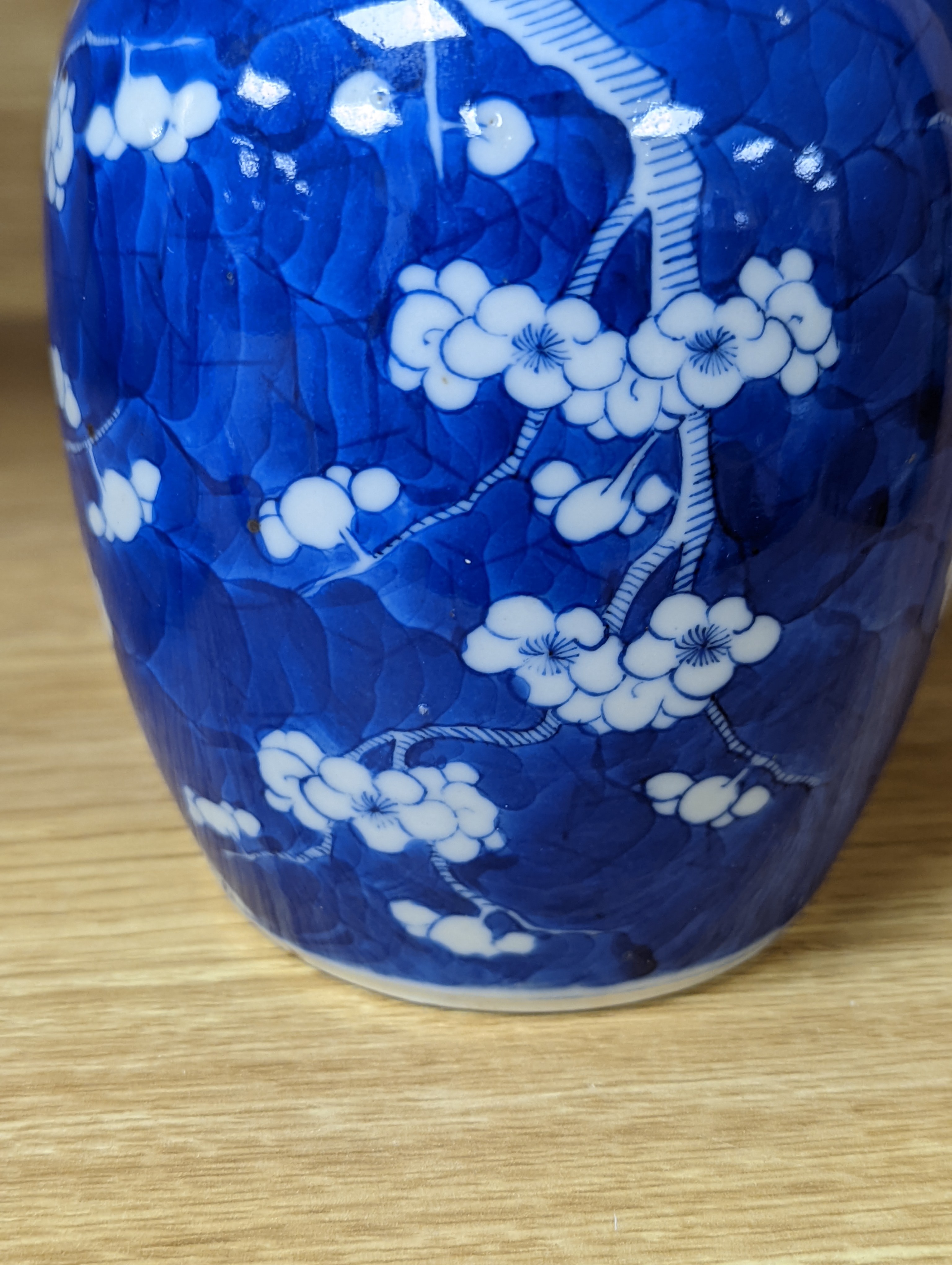 A 19th century Chinese blue and white prunus jar 13.5cm